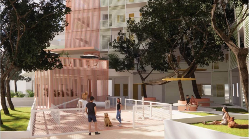 A communal pet park beneath the planted, blush-colored facade of Gándara Residence