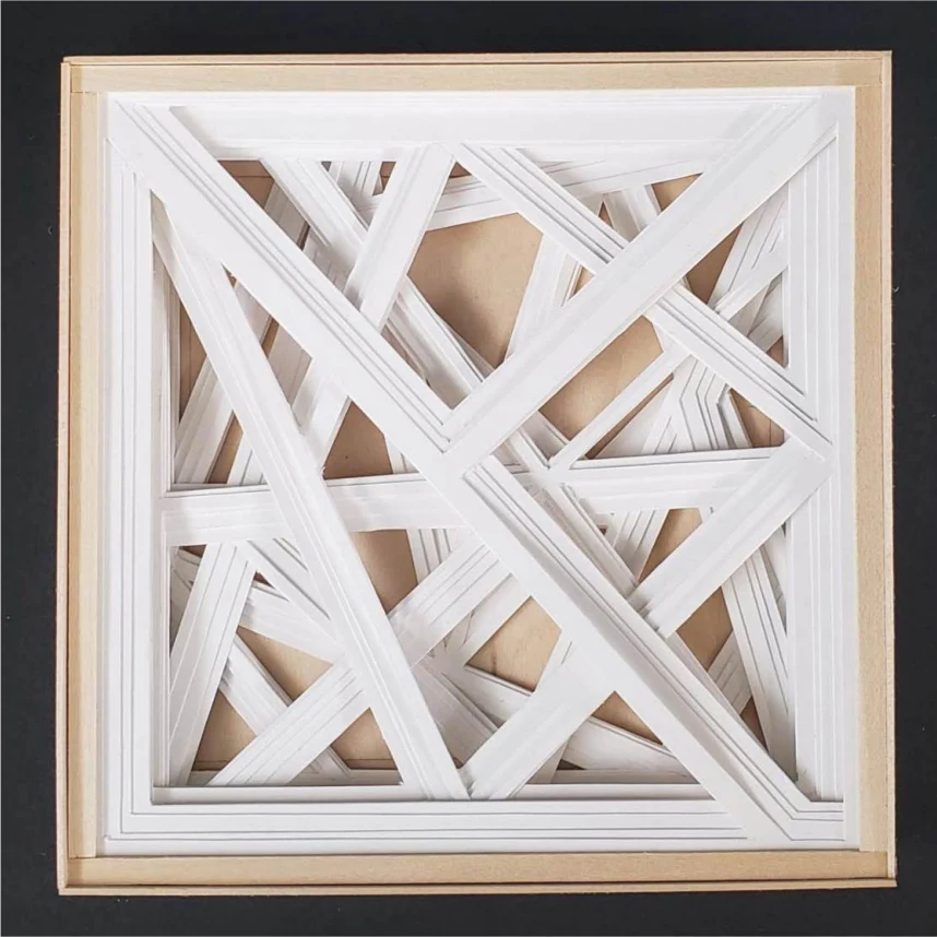 A framed composition of overlapping white paper strips and angular layers